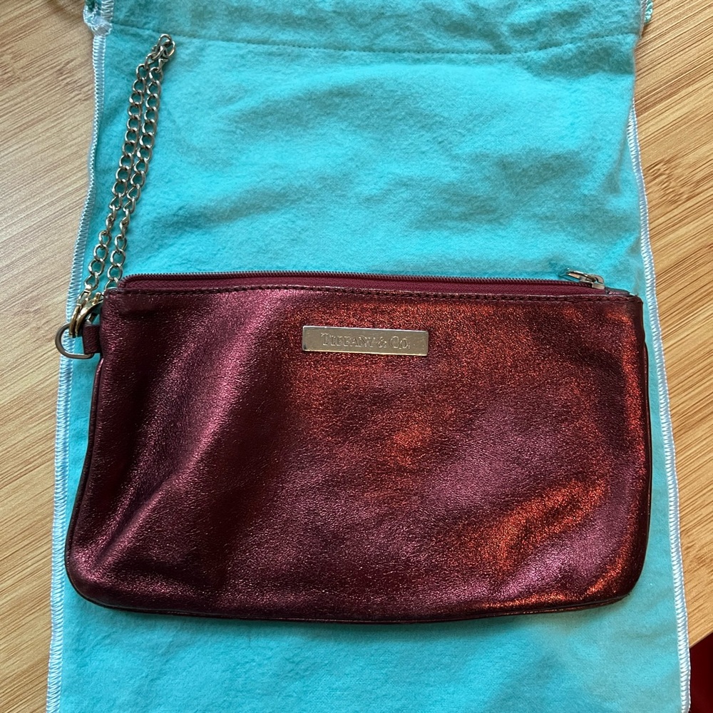 Tiffany & Co clutch. Burgundy color.